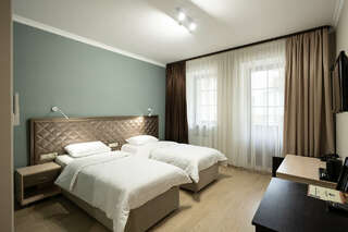 Гостиница Тройка Переславль-Залесский Двухместный номер с 2 отдельными кроватями-1